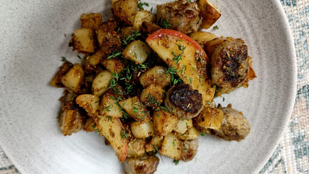 Photograph of Sausage, mustard & apple hash.