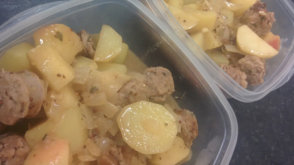 Photograph of Sausage with apple and mustard.