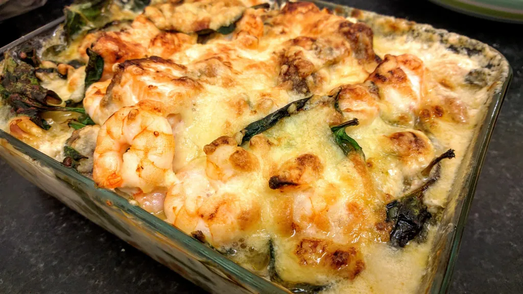 Photograph of Seafood and spinach pasta.