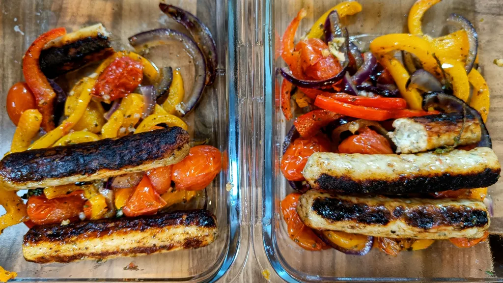 Photograph of Sheet pan sausage, peppers and onions.