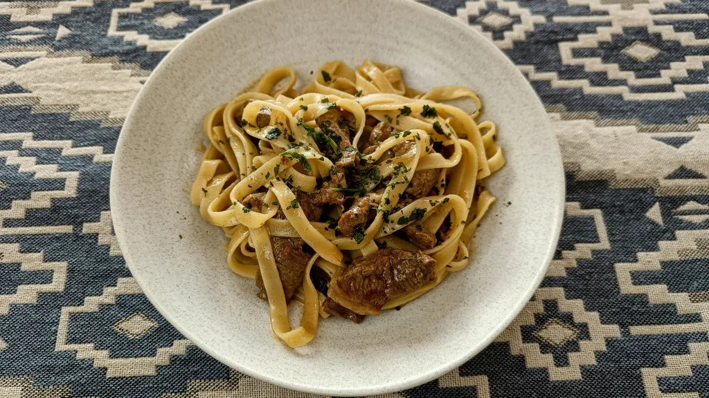 Photograph of Silk road-style lamb & cumin pasta.