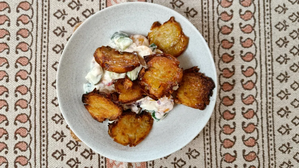 Photograph of Smashed potato salad.