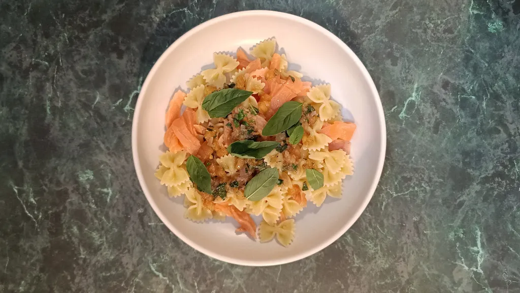 Photograph of Smoked salmon pasta with sauce vièrge.