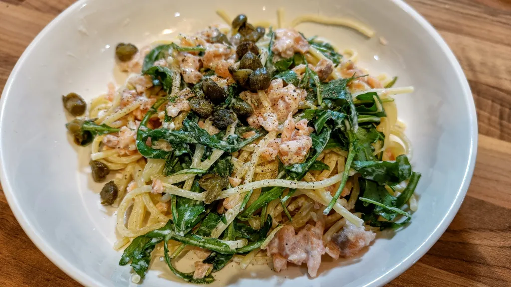 Photograph of Smoked salmon spaghetti with crispy capers.
