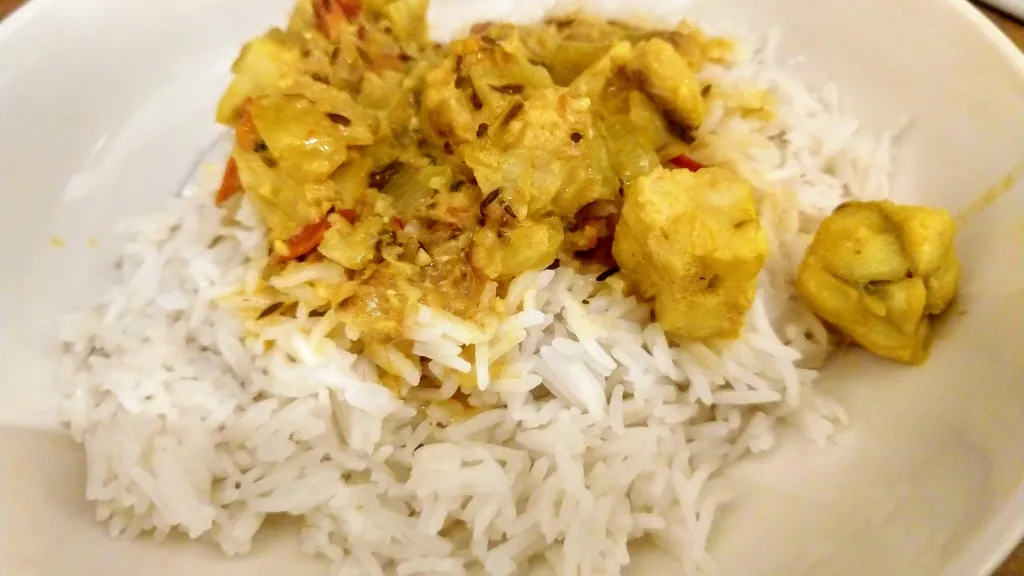 Photograph of South indian-style coconut fish curry.
