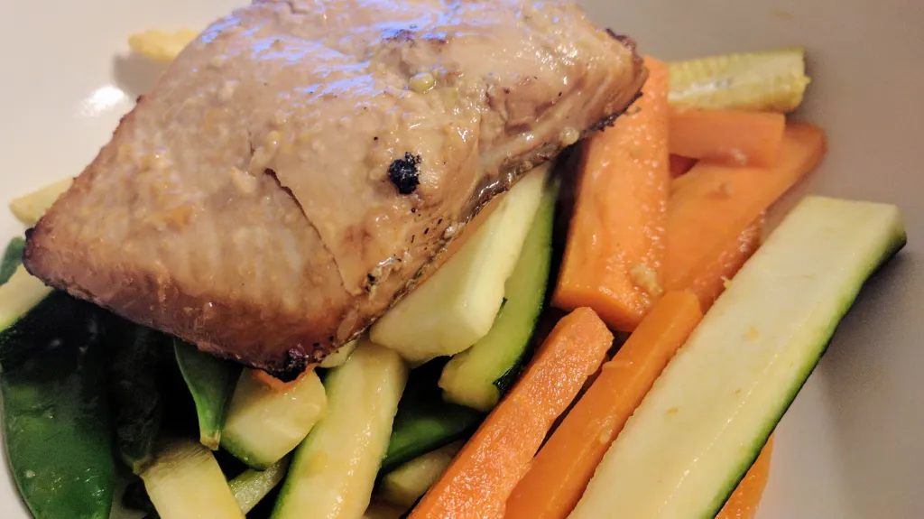 Photograph of Soy salmon with sesame stir fry.
