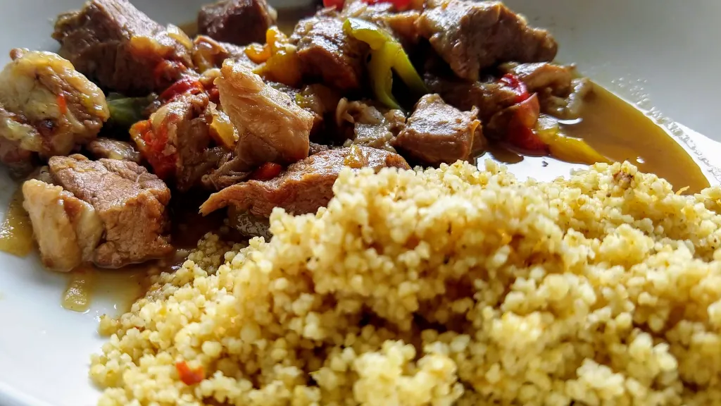 Photograph of Spanish lamb with sherry, honey & peppers.