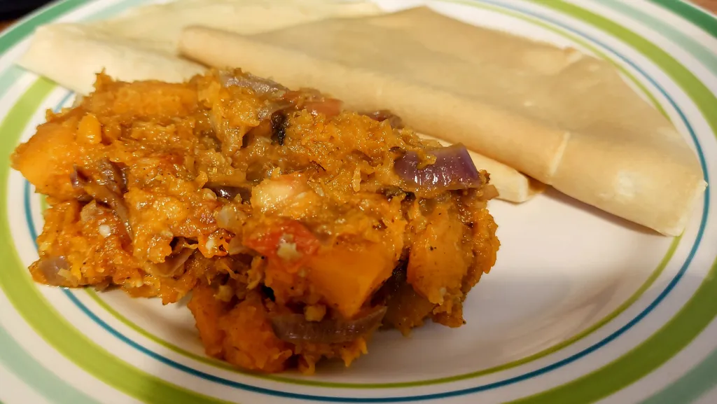 Photograph of Spiced butternut mash with pancake omelettes.