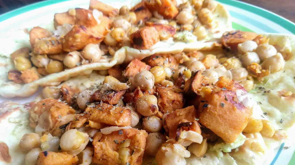 Photograph of Spiced chickpea and sweet potato flatbreads.