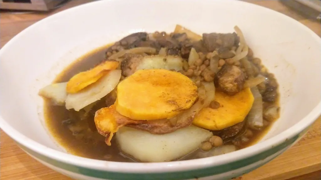 Photograph of Spiced mushroom & lentil hotpot.