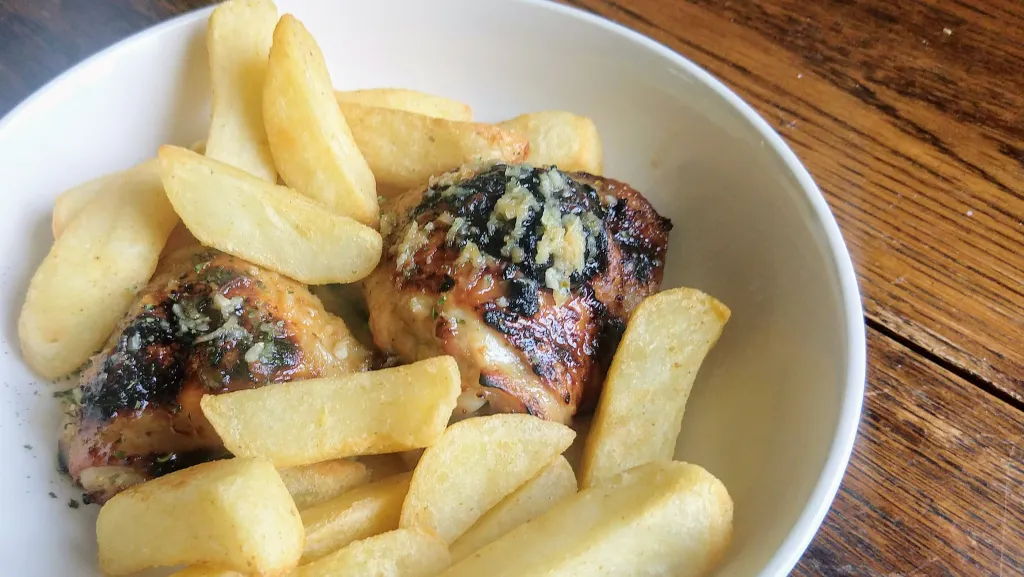 Photograph of Spicy coconut grilled chicken thighs.