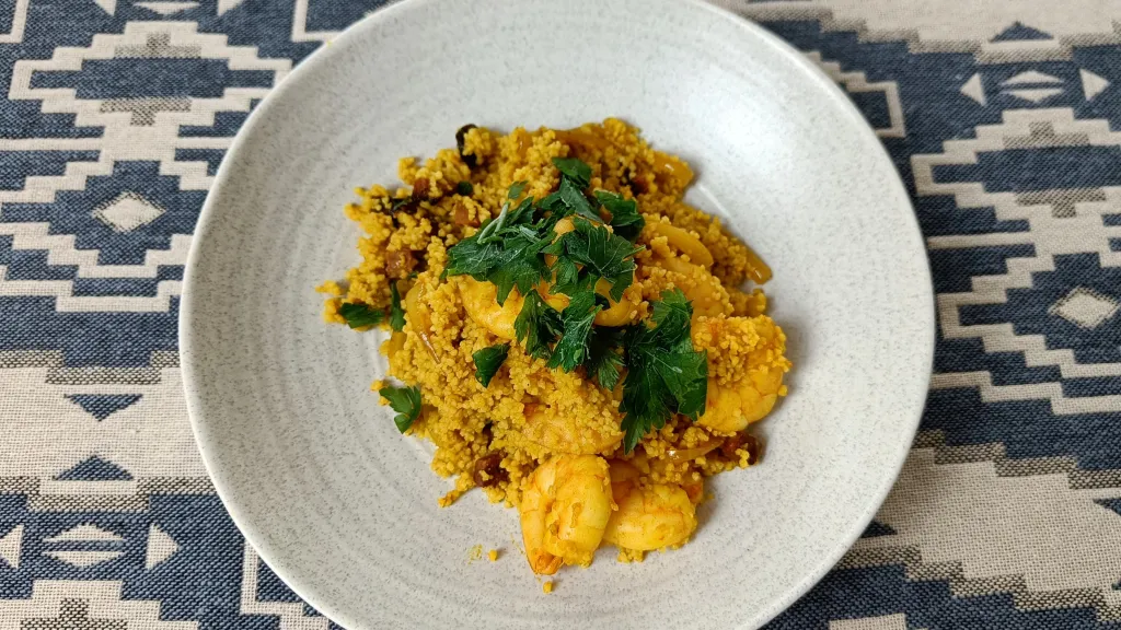 Photograph of Spicy couscous recipe with shrimp and chorizo.
