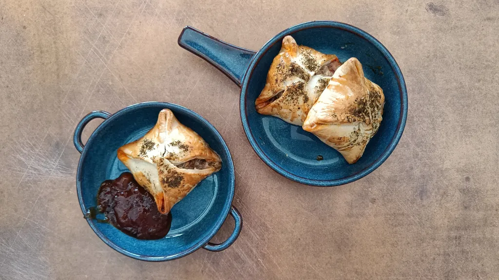 Photograph of Spicy lamb and baharat parcels.