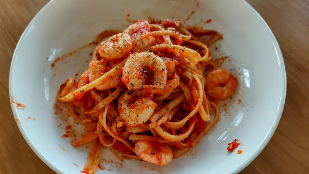 Photograph of Spicy shrimp tomato pasta.