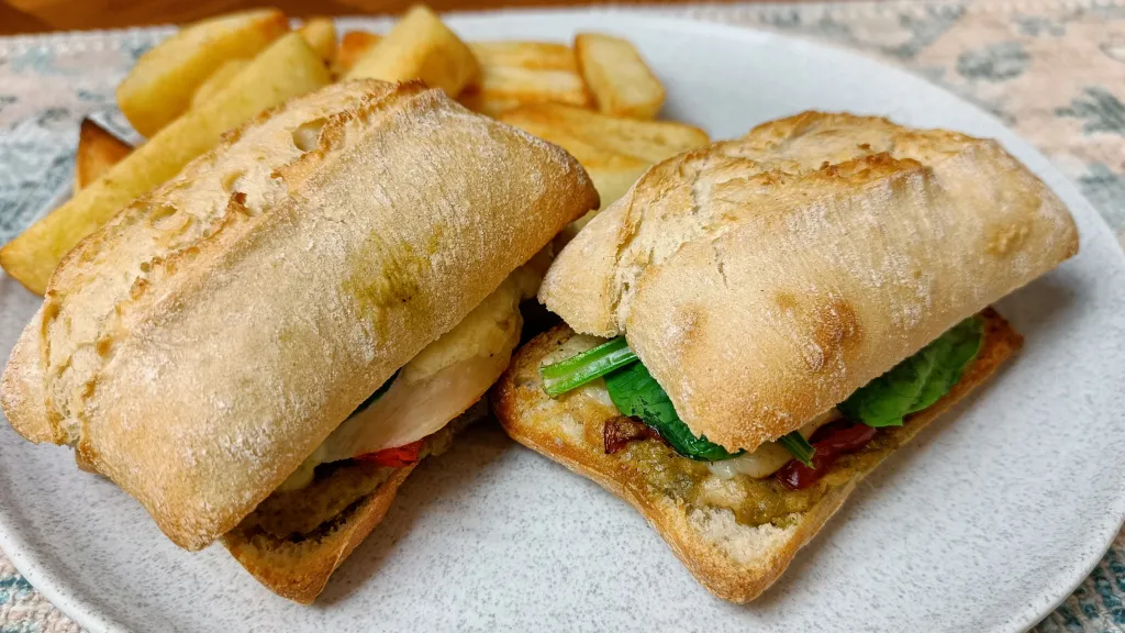 Photograph of Sun-dried tomato pesto turkey sandwich.