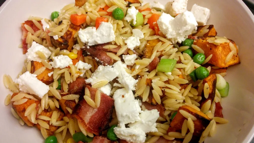 Photograph of Sweet potato, bacon & orzo pasta salad.