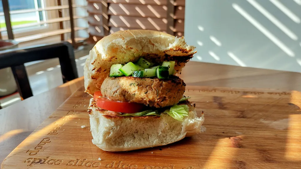 Photograph of Tuna burgers with cucumber salsa.