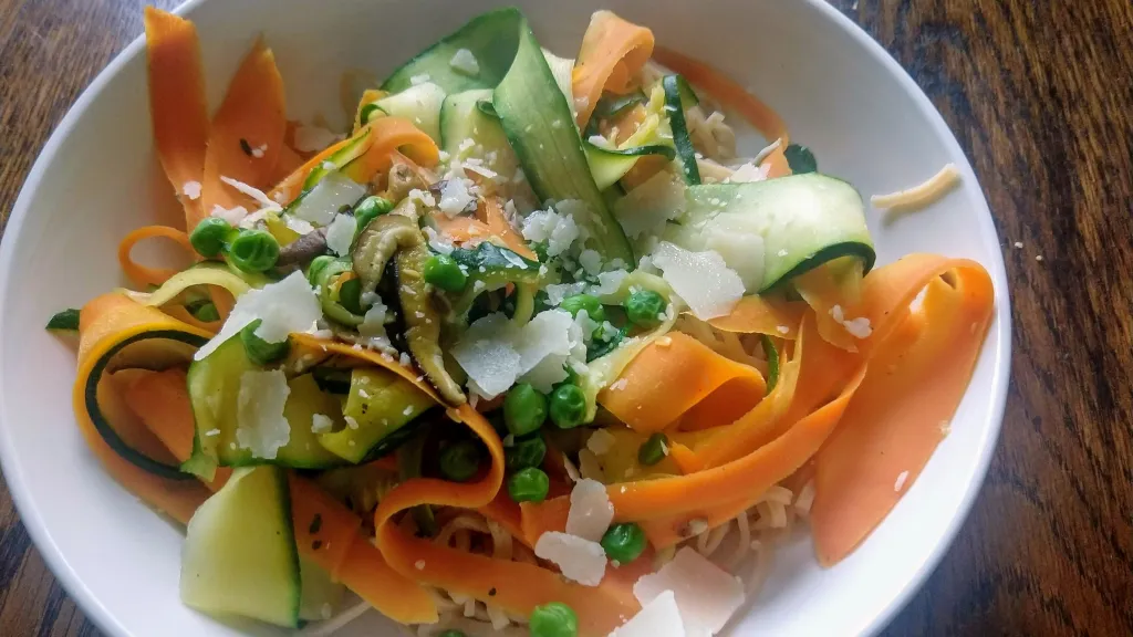 Photograph of Vegetable and egg noodle ribbons.